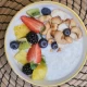 Rice porridge with fresh fruits and berries