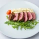 Ramstek odležao u ulju serviran sa aromatičnim puterom i krompirom 300g